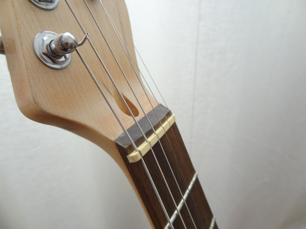 Sillet de tête en Plastique pour guitare classique couleur ivoire
